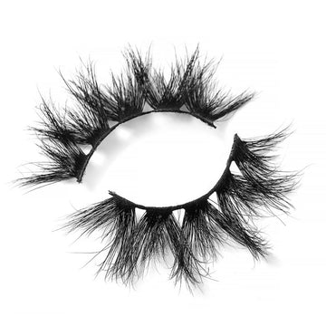 On a white background, beautiful two black eye lashes called Tamika Mink Lashes in a flare shape. 20mm length. Material : 3D Mink. Bold, Fluttery, Full-Body Effect.